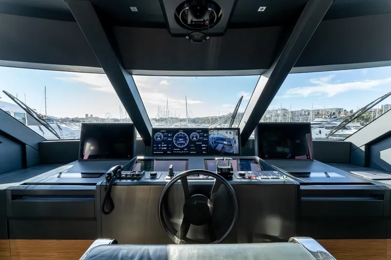 M Forever Yacht Photos Pics Cockpit of 2021 Custom Line Navetta 33 yacht with modern navigation equipment.