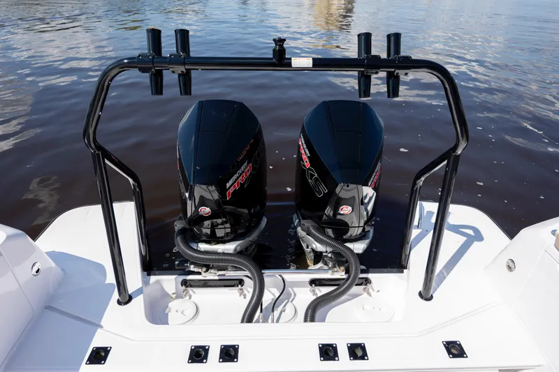  Yacht Photos Pics 2024 Axopar 37 XC boat with dual Mercury Pro XS outboard engines on water.