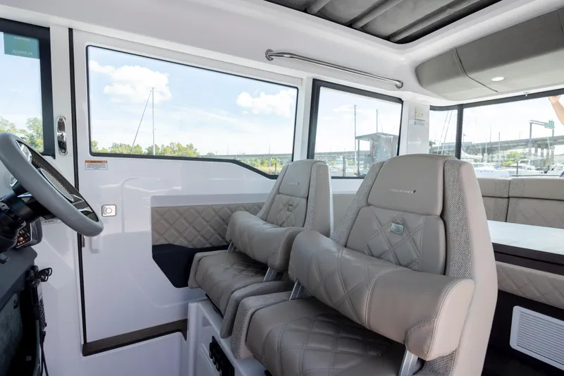 Yacht Photos Pics 2024 Axopar 37 XC interior with luxurious seating and modern design.