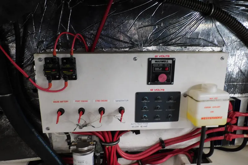 Squall Line Yacht Photos Pics Electrical panel of a 1995 Tiara Yachts 3500 Express with wiring and controls.