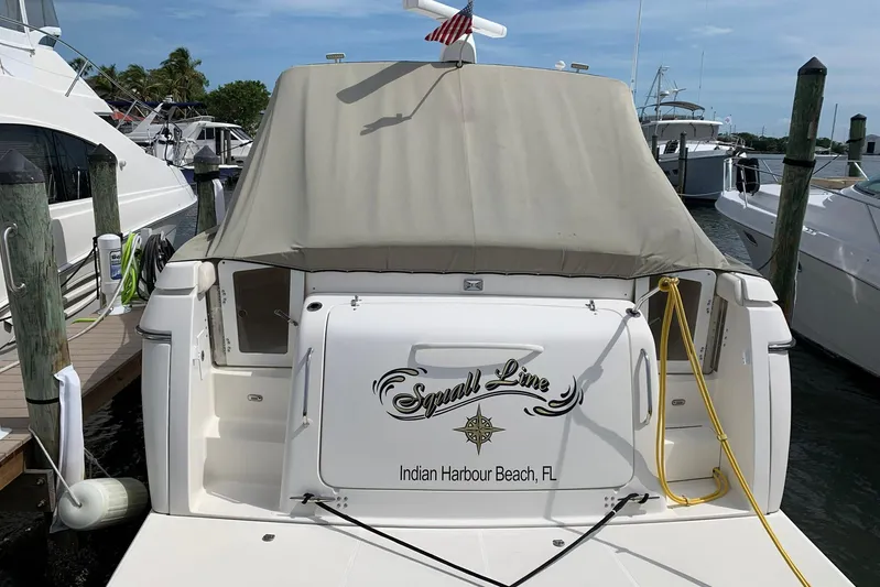 Squall Line Yacht Photos Pics 1995 Tiara Yachts 3500 Express docked at Indian Harbour Beach, Florida marina.