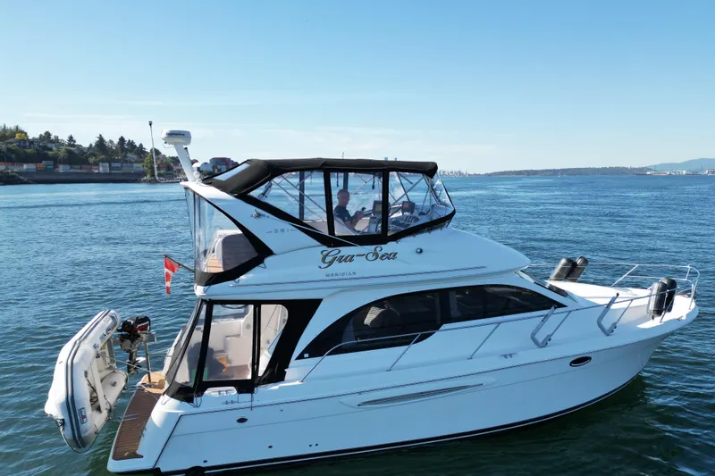 Gra-sea Yacht Photos Pics 2005 Meridian 381 Sedan yacht cruising on a sunny day, featuring sleek design and spacious deck.