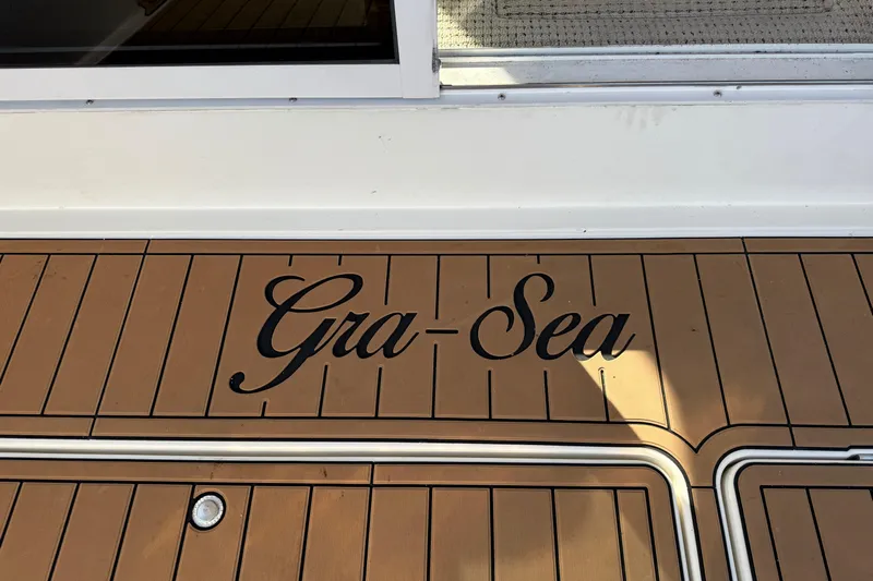 Gra-sea Yacht Photos Pics 2005 Meridian 381 Sedan boat deck with "Gra-Sea" nameplate.