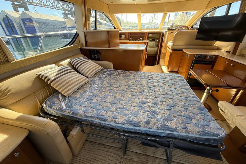 Gra-sea Yacht Photos Pics Interior of 2005 Meridian 381 Sedan with convertible sofa bed and modern amenities.
