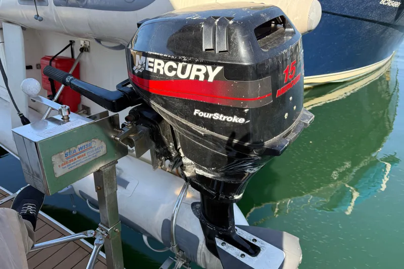 Gra-sea Yacht Photos Pics Mercury 15 horsepower outboard motor on a 2005 Meridian 381 Sedan yacht.
