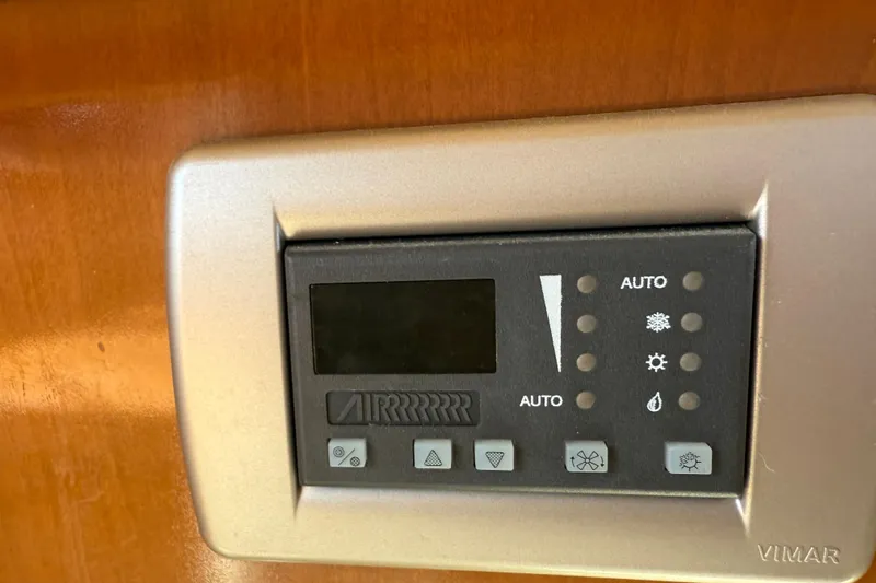 Gra-sea Yacht Photos Pics Control panel on a 2005 Meridian 381 Sedan boat, featuring various function buttons.