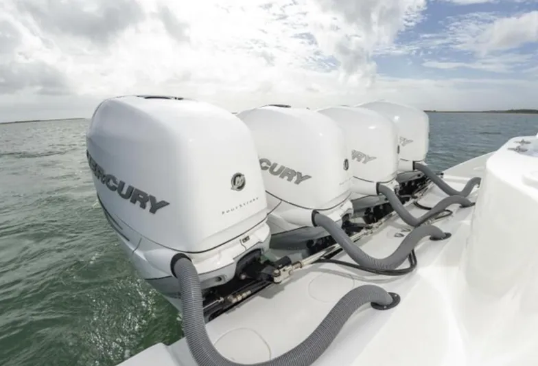  Yacht Photos Pics 2018 Yellowfin 39 boat with four Mercury outboard engines on the water.