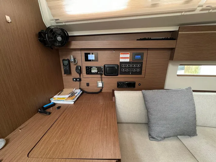 Odyssey Yacht Photos Pics Interior of 2021 Beneteau Oceanis 40.1 yacht with navigation controls and seating area.