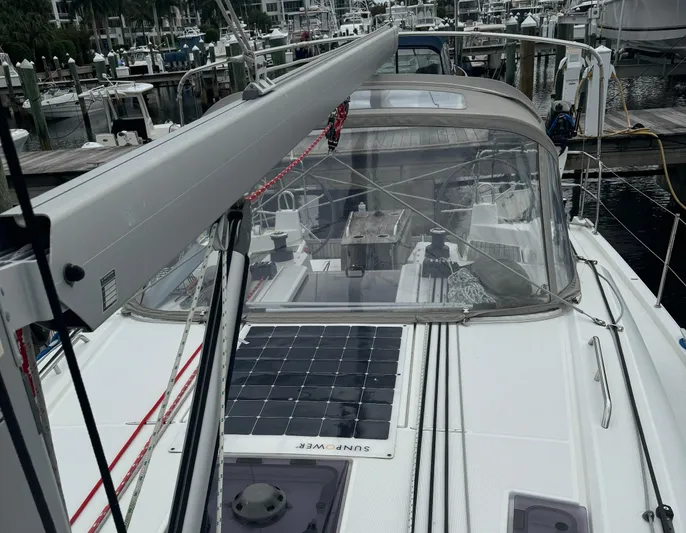 Odyssey Yacht Photos Pics 2021 Beneteau Oceanis 40.1 sailboat with solar panels docked at marina.