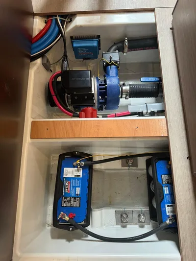 Odyssey Yacht Photos Pics Engine compartment of 2021 Beneteau Oceanis 40.1 sailboat with batteries and wiring.