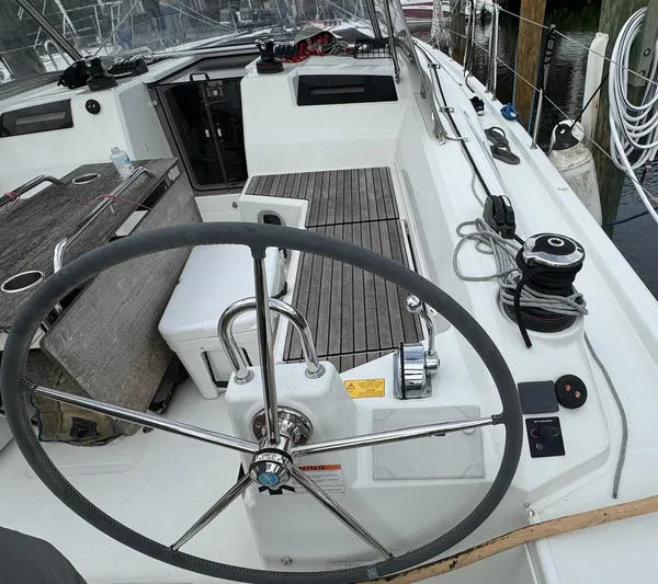 Odyssey Yacht Photos Pics 2021 Beneteau Oceanis 40.1 yacht cockpit with steering wheel and deck view.