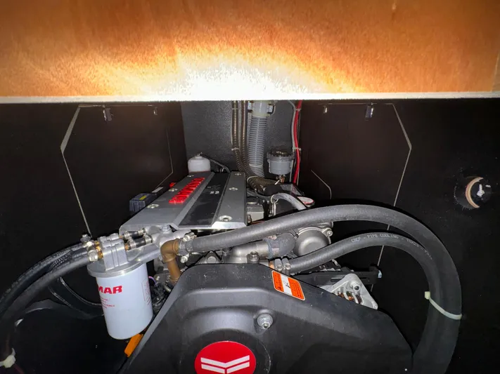 Odyssey Yacht Photos Pics Engine compartment of 2021 Beneteau Oceanis 40.1 sailboat, featuring Yanmar engine components.