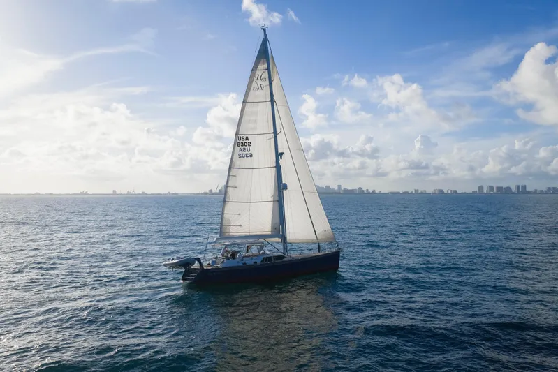 Blue Star Yacht Photos Pics Sailing yacht Hylas 63, 2013 model, cruising on open sea under clear skies.