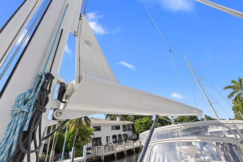 Blue Star Yacht Photos Pics Sailboat mast and rigging on a 2013 Hylas 63 under clear blue sky.