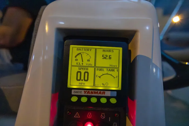 Blue Star Yacht Photos Pics Yanmar engine display on a 2013 Hylas 63 yacht showing battery voltage and fuel level.