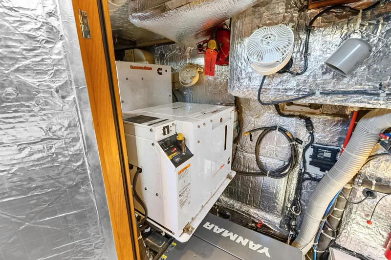Blue Star Yacht Photos Pics Engine room of 2013 Hylas 63 yacht with Cummins Onan generator and Yanmar equipment.
