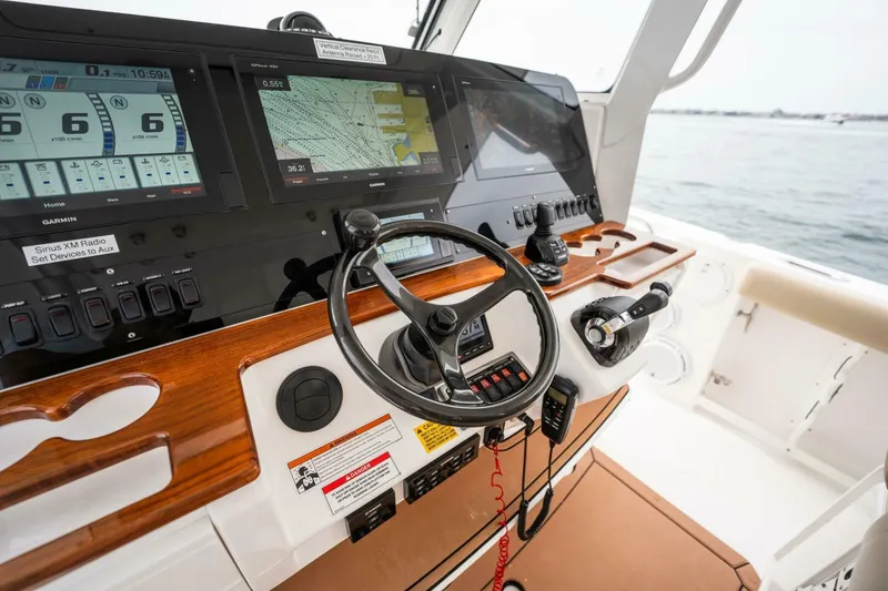 Mad Hatter Yacht Photos Pics 2019 Everglades 435 Center Console helm with advanced navigation and control systems.