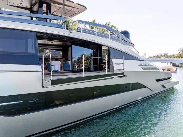 Caffeine Yacht Photos Pics 2023 Pershing GTX 116 yacht docked, showcasing sleek design and luxurious features.