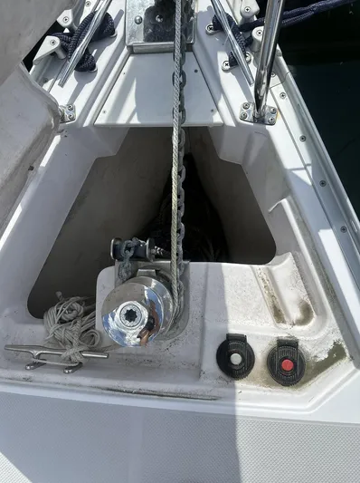 Sea Urchin Yacht Photos Pics Anchor locker of a 2013 Catalina 355 sailboat with winch and rope.