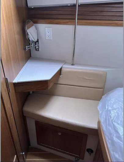 Sea Urchin Yacht Photos Pics Interior of 2013 Catalina 355 sailboat with seating and small table.