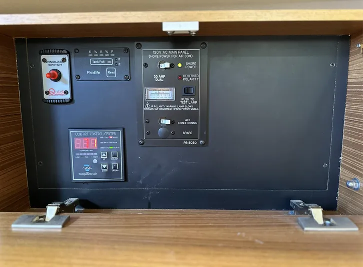 Sea Urchin Yacht Photos Pics Control panel of a 2013 Catalina 355 sailboat, featuring various switches and displays.