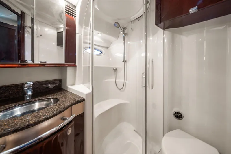 Vivid Imagination Yacht Photos Pics Luxurious bathroom in 2007 Sea Ray 52 Sedan Bridge yacht with modern fixtures.
