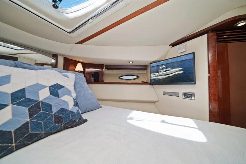 Vivid Imagination Yacht Photos Pics Luxurious 2007 Sea Ray 52 Sedan Bridge cabin with modern decor and TV.