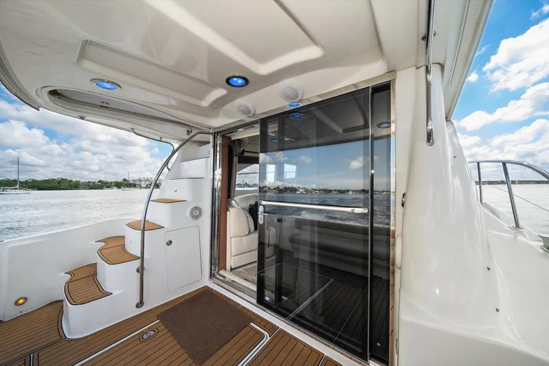 Vivid Imagination Yacht Photos Pics 2007 Sea Ray 52 Sedan Bridge yacht with elegant interior and scenic water view.