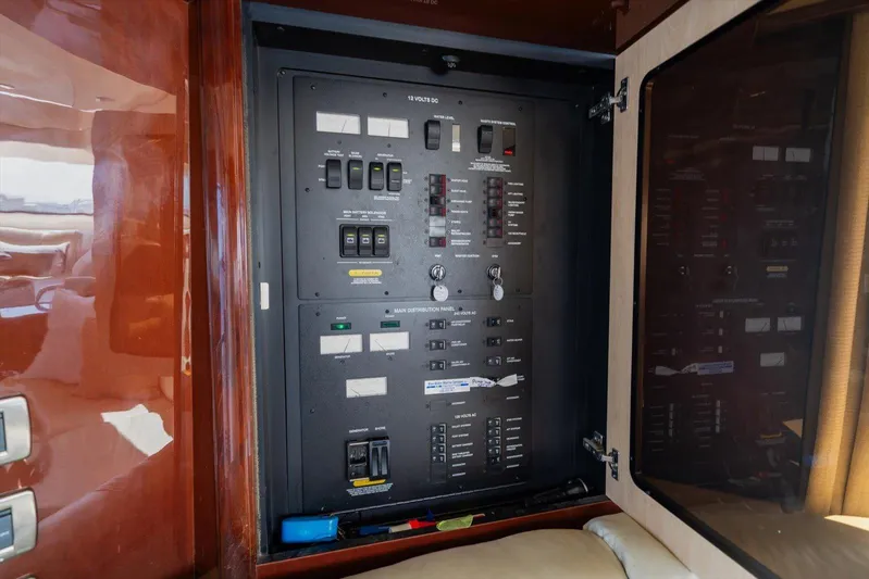 Vivid Imagination Yacht Photos Pics Electrical panel inside a 2007 Sea Ray 52 Sedan Bridge yacht.