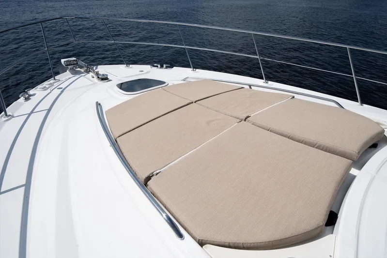 Vivid Imagination Yacht Photos Pics 2007 Sea Ray 52 Sedan Bridge yacht with sunbathing cushions on deck.