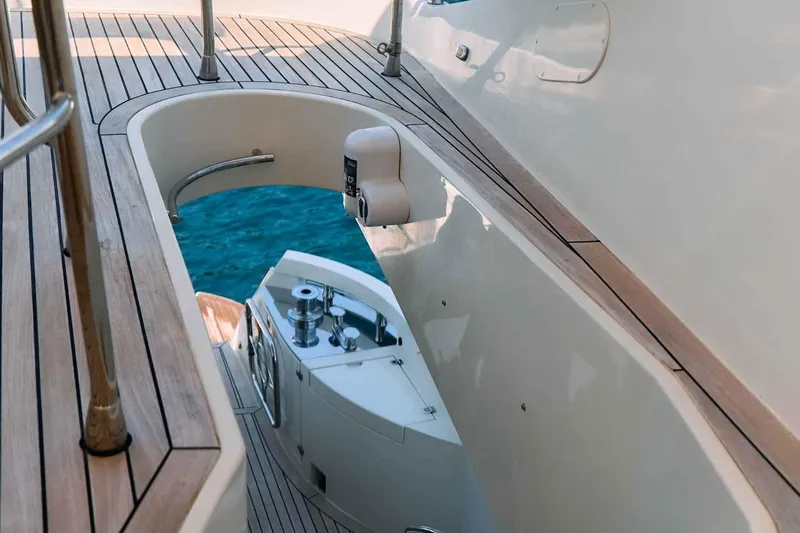 Markisia Yacht Photos Pics 2010 Marquis 720 Flybridge yacht deck with polished wood and ocean view.