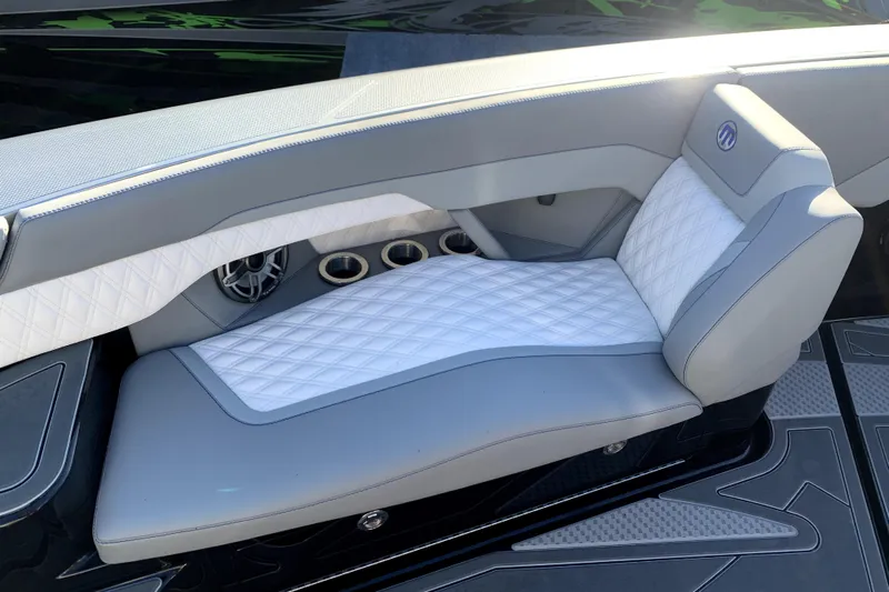  Yacht Photos Pics Luxurious seating in 2026 Mystic Powerboats M3800, featuring elegant quilted upholstery.