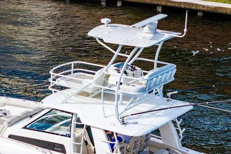  Yacht Photos Pics Boston Whaler 420 Outrage 2022 boat with elevated helm station on water.