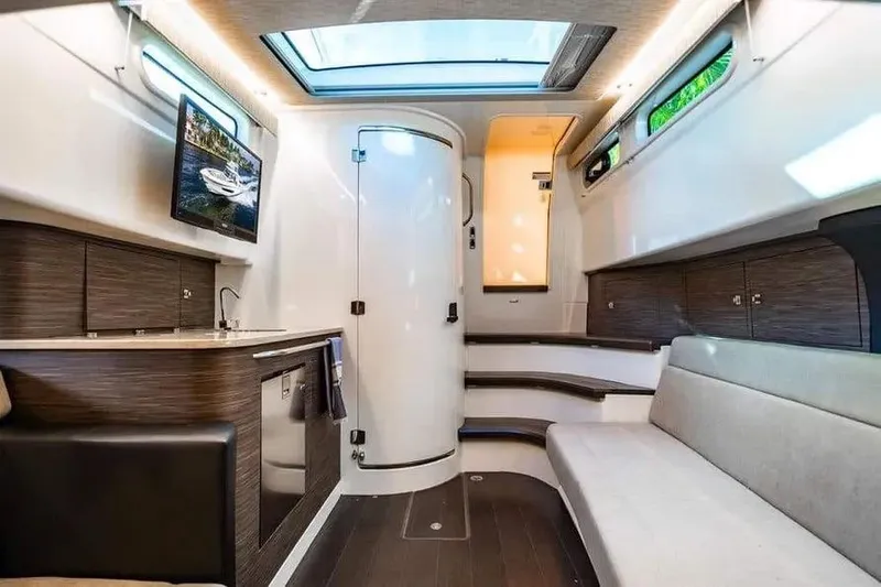  Yacht Photos Pics Interior of 2022 Boston Whaler 420 Outrage, featuring modern design and comfortable seating.