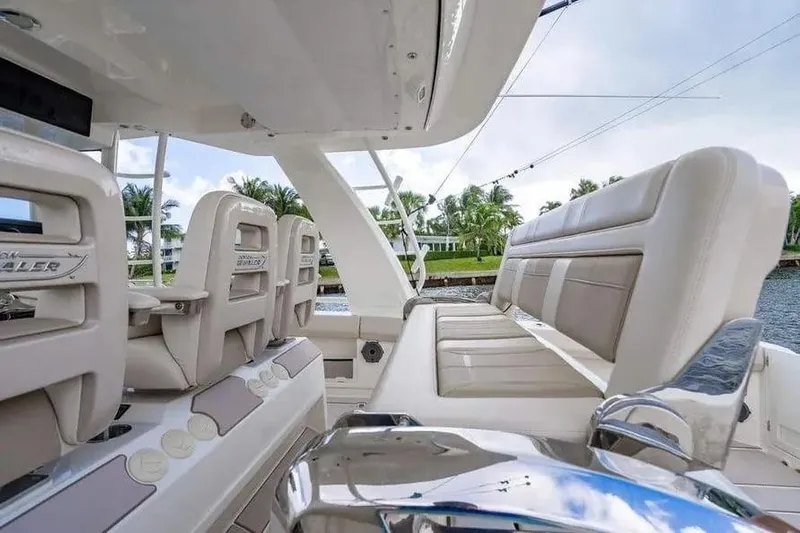  Yacht Photos Pics 2022 Boston Whaler 420 Outrage interior with luxurious seating and modern design.