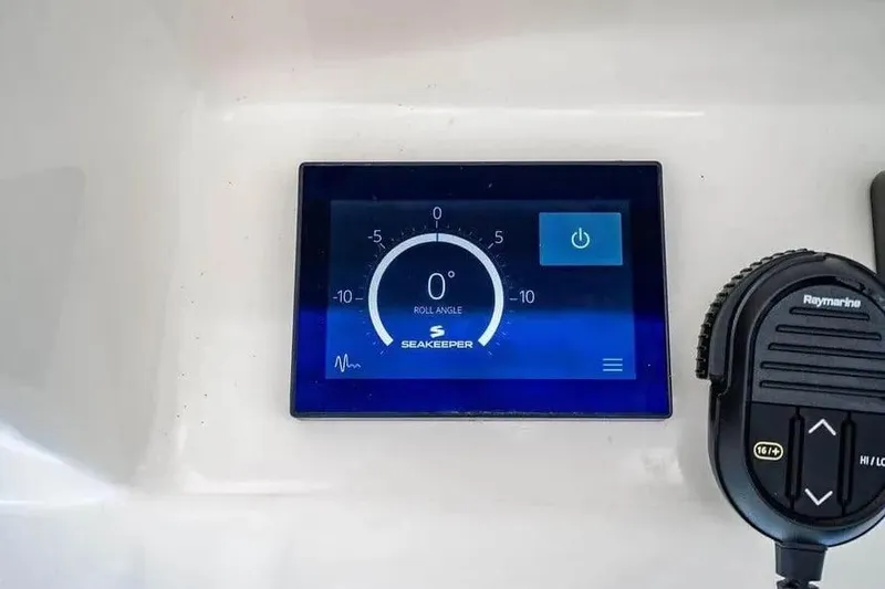  Yacht Photos Pics Seakeeper control panel on 2022 Boston Whaler 420 Outrage boat dashboard.