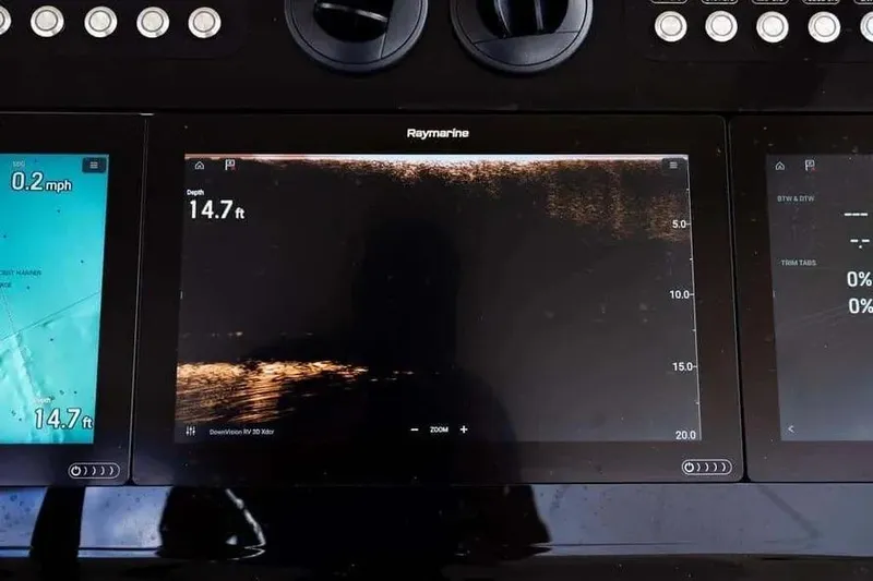  Yacht Photos Pics Boston Whaler 420 Outrage 2022 dashboard with Raymarine navigation displays.