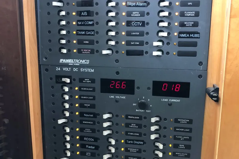 Evening Star Yacht Photos Pics 2003 Cape Horn Trawler electrical panel with switches and digital displays for voltage and current.