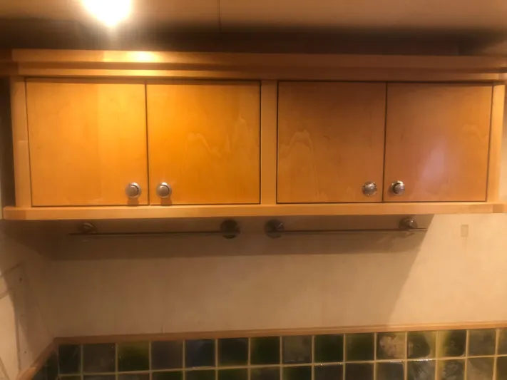 Evening Star Yacht Photos Pics Wooden cabinets in a 2003 Cape Horn Trawler kitchen interior.