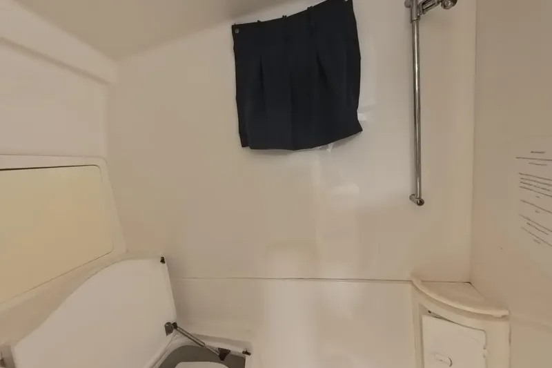  Yacht Photos Pics Interior of a 2005 Intrepid 348 Walkaround boat, featuring a compact cabin space.