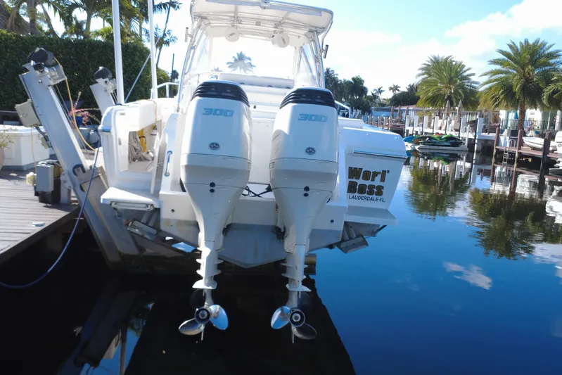  Yacht Photos Pics 2005 Intrepid 348 Walkaround boat with dual 300 HP engines docked in a marina.
