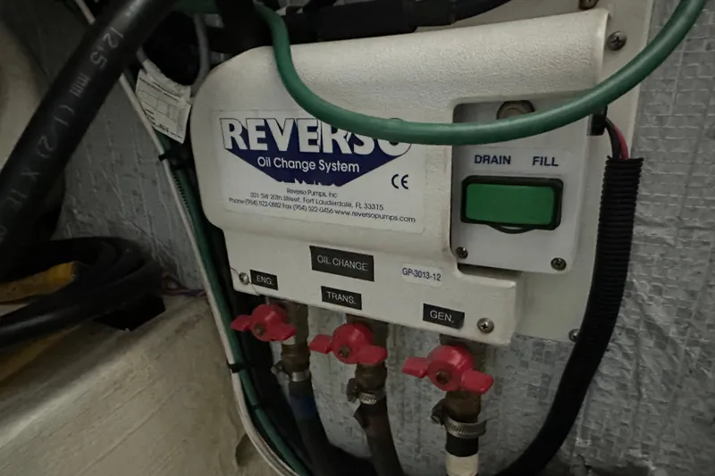 Big Blue Yacht Photos Pics Reverso oil change system in 2010 Back Cove 37 boat engine room.