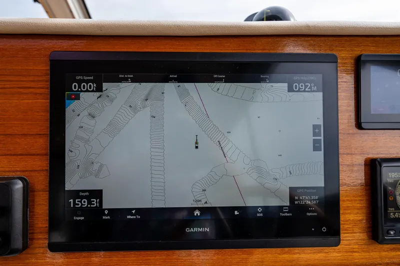 Big Blue Yacht Photos Pics Garmin GPS display on 2010 Back Cove 37 boat, showing navigation map and data.