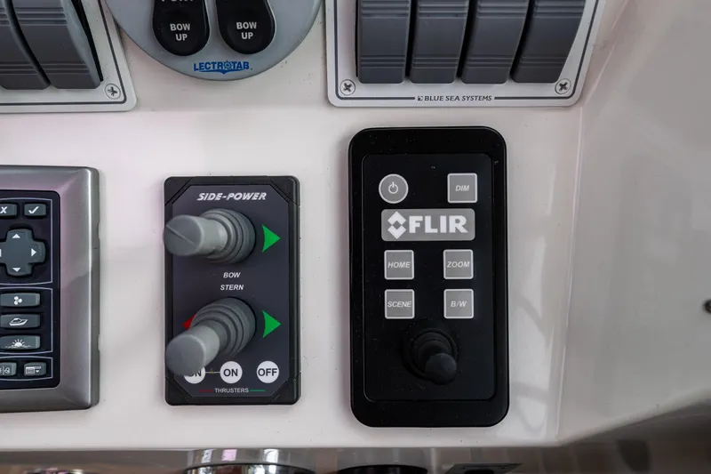 Big Blue Yacht Photos Pics Control panel of a 2010 Back Cove 37 boat with FLIR and Side-Power systems.