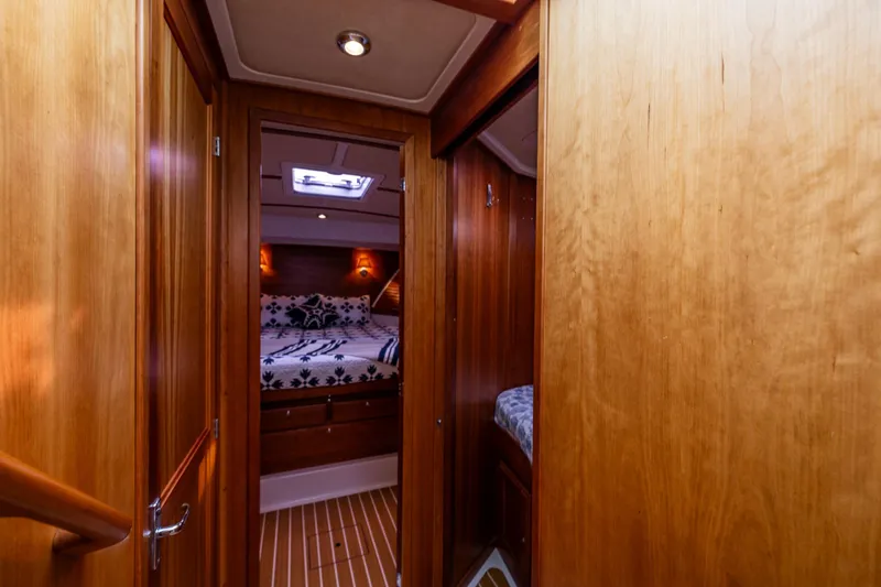 Big Blue Yacht Photos Pics Luxurious cabin interior of 2010 Back Cove 37 yacht with wooden finish.