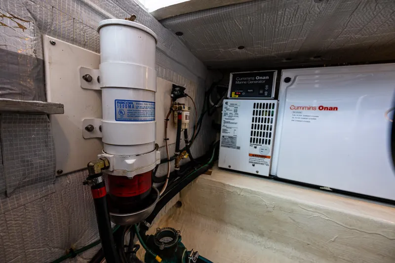 Big Blue Yacht Photos Pics Engine room of 2010 Back Cove 37 with Cummins Onan marine generator.