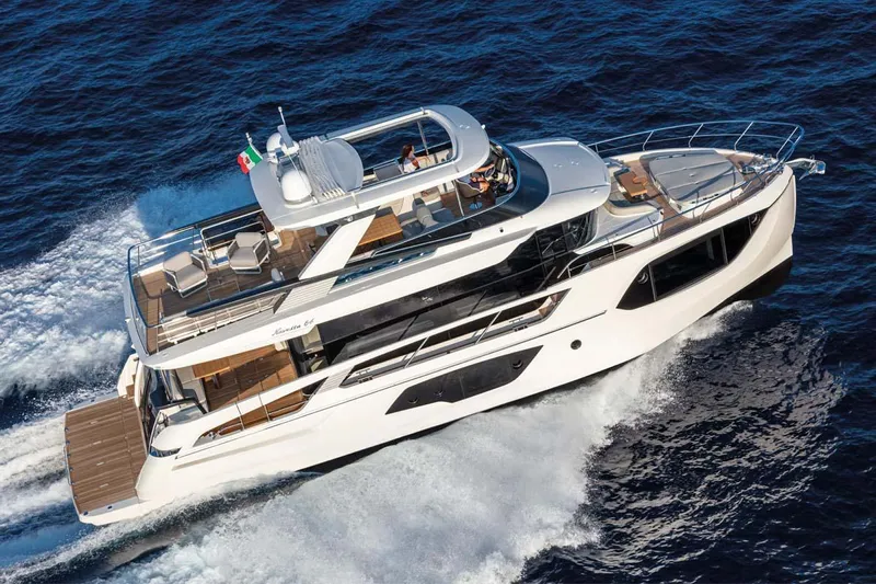  Yacht Photos Pics Manufacturer Provided Image: 2022 Absolute 64 Navetta luxury yacht cruising on the ocean.