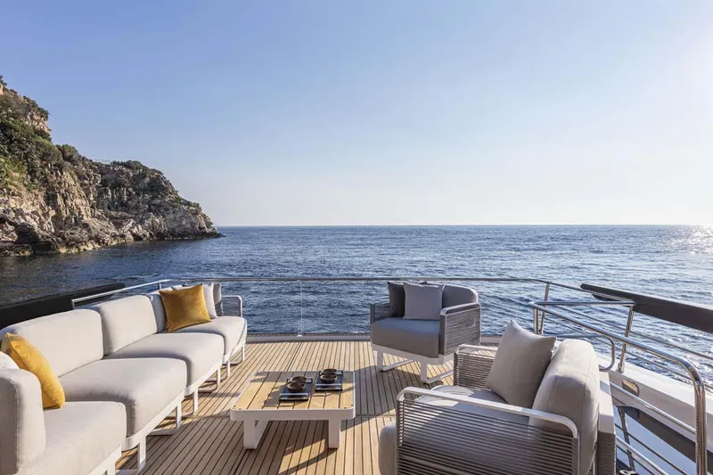  Yacht Photos Pics Manufacturer Provided Image: Luxury deck of 2022 Absolute 64 Navetta yacht with ocean view.