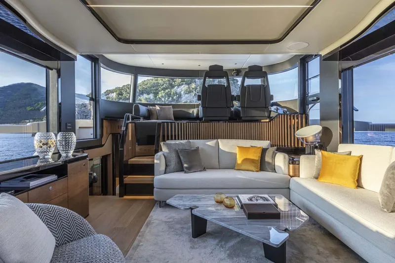 Yacht Photos Pics Manufacturer Provided Image: Luxurious interior of the 2022 Absolute 64 Navetta yacht with modern furnishings and panoramic views.