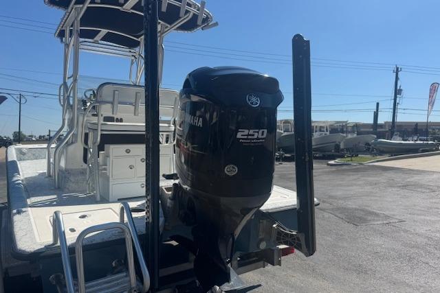 2016 Dargel Kat 250 HDX boat with Yamaha 250 outboard motor, parked outdoors.